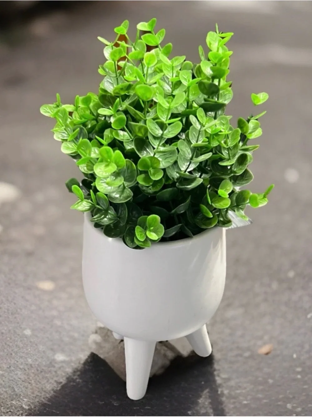 Artificial Potted Plant in White Tripod Planter